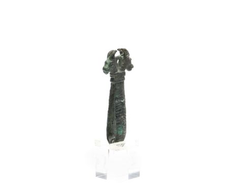 Luristan, a bronze appliek with two goat heads, ca. 800 BC. h. 7,5 cm. [1]