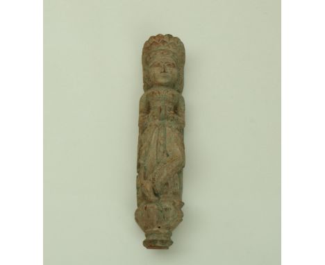 India, Gujarat, a carved polychrome architectural wall decoration in the form of a standing temple servant. h. 87 cm. [1]