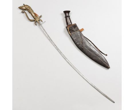 Nepal, Gurka, a dagger, kukri in leather sheath and Sri Lanka, a saber, kastane, with a gilded brass hilt decorated with a de