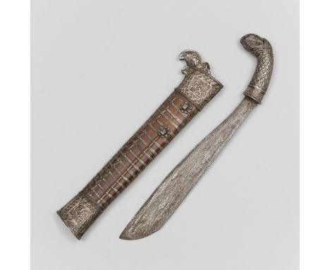 Sumatra, short sword, one edged pamor broad blade, silver hilt with floral and geometric patterns, the wooden scabbard with r
