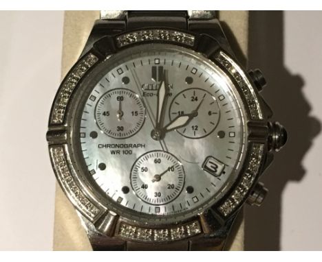 A fine looking ladies Citizen Chronograph watch with Eco Drive, date feature to dial surrounded by diamond chip stones to bez