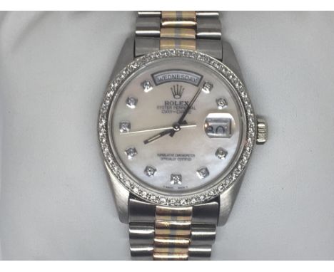 A Gents Rolex Oyster Perpetual day date Superlative Chronometer, the Watch with diamond battons, diamond set bezel, and a ver