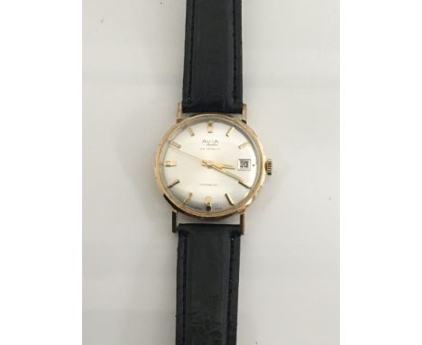 A Gents Vintage Gold cased Avia 25 Jewel Watch the dial with date aperture. The reverse has a personal inscription. Working o