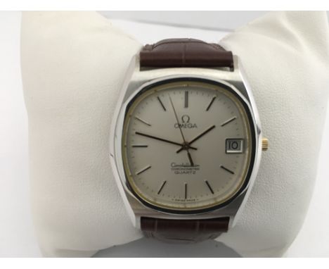 A gents Omega Constellation Chronometer Quartz  watch with a stainless steel case and leather strap. Postage to the U.K. is £
