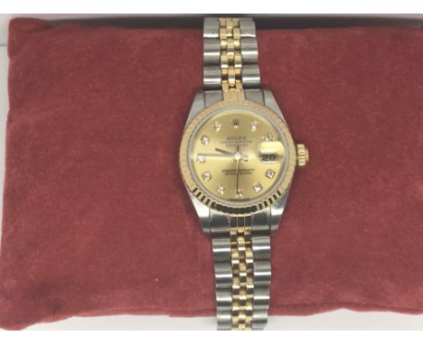 An exceptional ladies Rolex Datejust Superlative Chronometer, 18ct Gold and steel case and bracelet, diamond set champagne di