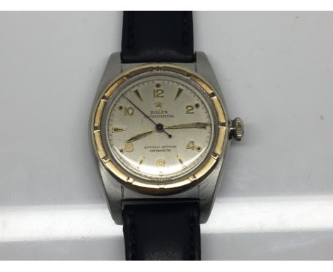 A Genuine Vintage 1948  Rolex Oyster Perpetual Officialy Certified Chronometer, Bubble back with a gold bezel watch model num