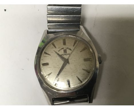 A Vintage Midi Favre-Leuba Geneve, Watch Stainless steel case, silvered dial with raised battons. Automatic (stop start when 