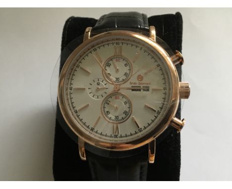 A Gents Enzo Giomani Chronograph watch, gold colour stainless steel case and leather strap, as new, complete with box, full w