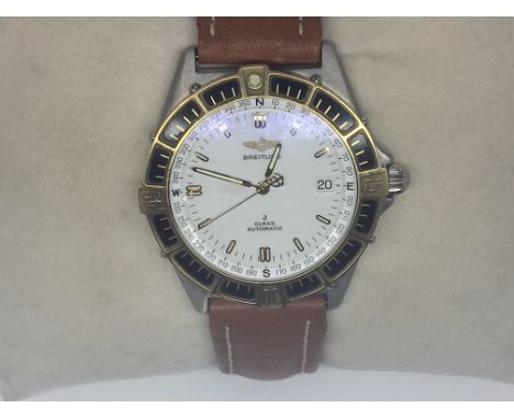 A Gents Breitling J Class Automatic watch the white dial with date apature brown leather strap. Full working order in very go