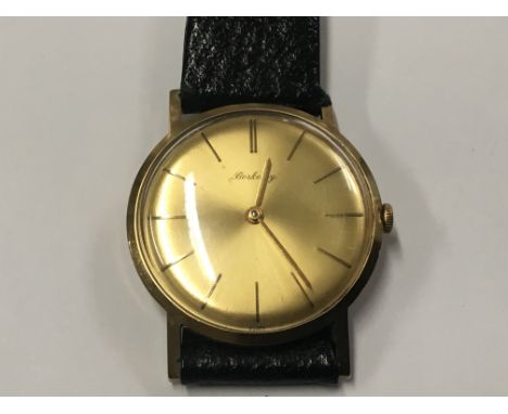 A 9ct Gold Berkeley Watch with champagne dial. Manual wind in working order. Postage to the U.K. is £15.