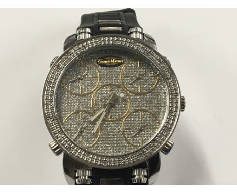 A Gents Five Zone World Timer made by Grand Master. Has a quartz movement and diamond set bezel. Postage to the U.K. is £15.