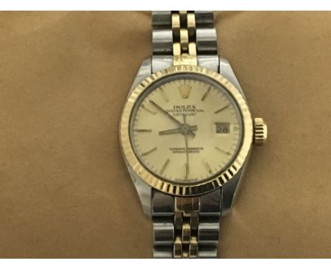A ladies Rolex Datejust Superlative Chronometer, bi- metal 18ct Gold and steel Champagne dial with date aperture. Full workin