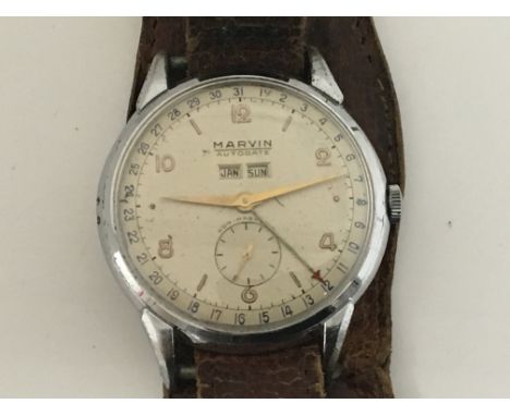 A rare Vintage Marvin Autodate Watch the dial with day, date and second subsidiary dial with outer second markers in a Crome 