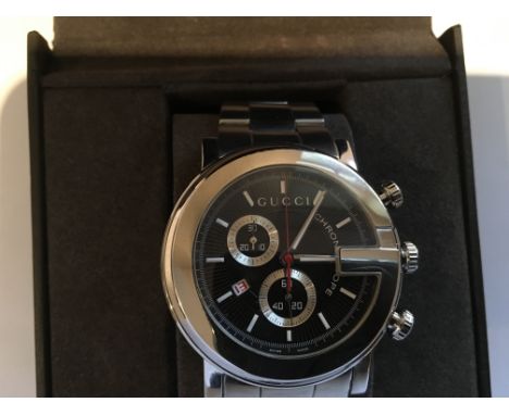 A fine Gents Gucci Chronograph watch crafted in robust stainless steel with a bold black dial, full working order and complet