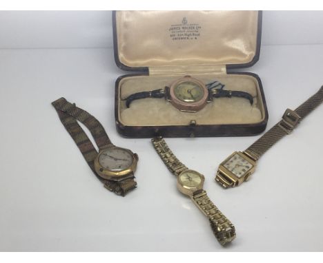 Four Vintage ladies watches comprising an 18ct Gold cased Exacto, a Swiss made 9ct Gold cased Watch, a Gold James Walker watc