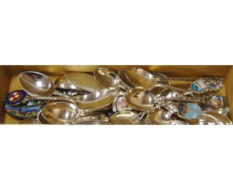 A collection of souvenir spoons to include sterling silver examples