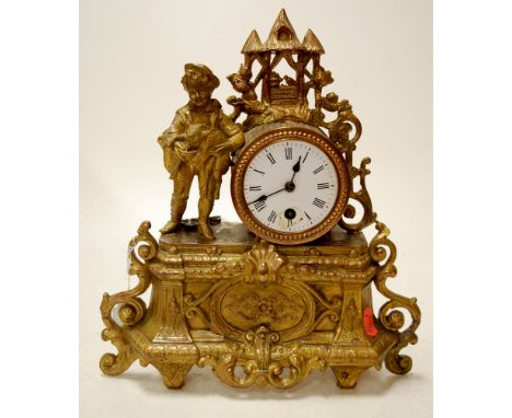 A late 19th century French gilt metal mantel clock having white enamel dial with Arabic numerals