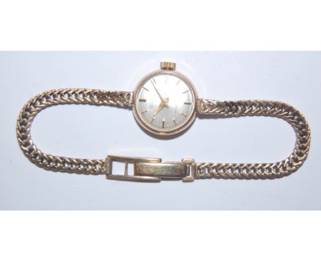 A ladies Pontiac 9ct gold cased dress watch on bracelet strap, having manual wind movement, gross weight 10.5g