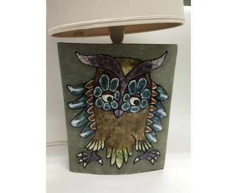 A modern design lamp depicting a brightly coloured owl, approx total height with shade 91cm.