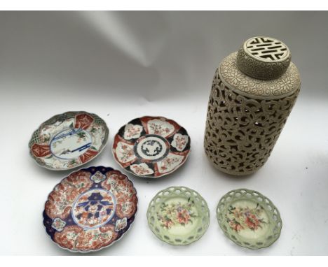 A group of oriental items to include three large dishes, a jar and two small saucers.