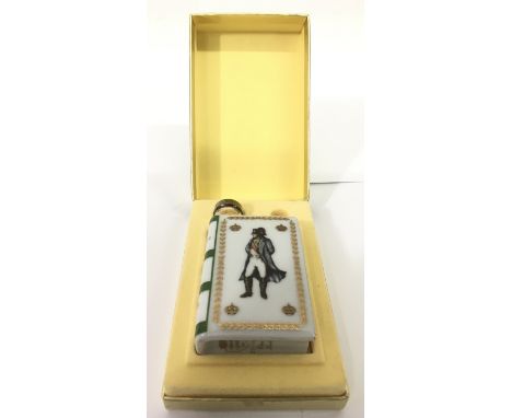 A limited edition, miniature bottle of Camus Napoleon Vielle Reserve Cognac, in Limoges porcelain bottle, decorated with  a p