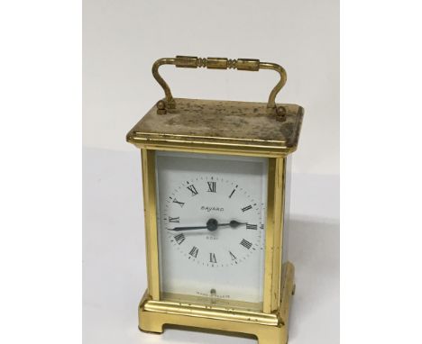 A brass cased French carriage clock the dial and back plate with retailer and makers Duverdrey &amp; Bloquel  Bayard (Not see