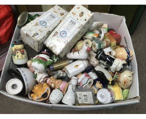 A box of ceramic figures, cruet sets etc.