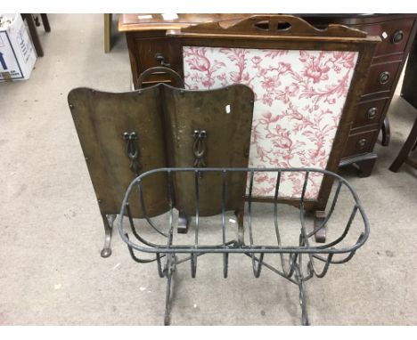 An oak firescreen, a copper example and a wrought iron flower basket (3).