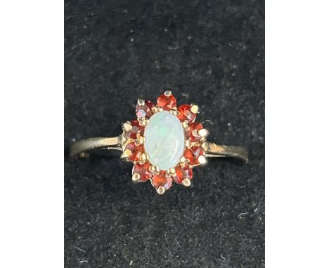 9ct Gold ring set with opals & garnets Size Q 1.5g 