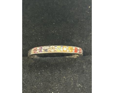 Silver ring set with multi coloured gem stones 