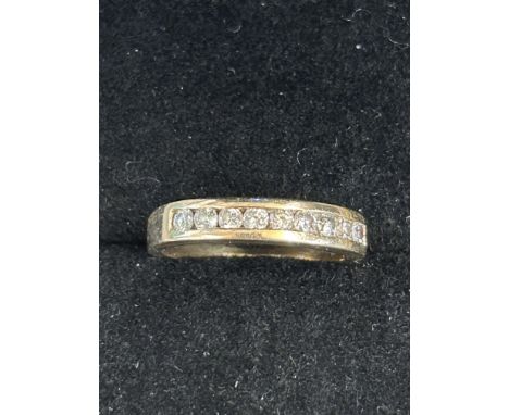 9ct Gold ring set with 9 diamonds Size K 2.7g 