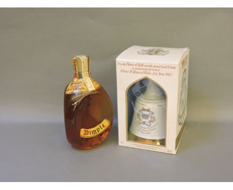 Bell's Scotch Whisky, commemorating the birth of Prince William of Wales, together with a bottle of Dimple Scotch Whisky