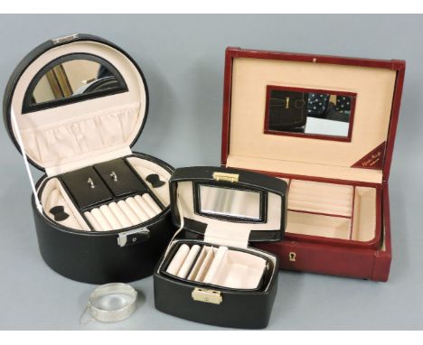 A leather jewellery box, two other jewellery boxes with lift out trays, and a sterling silver bangle