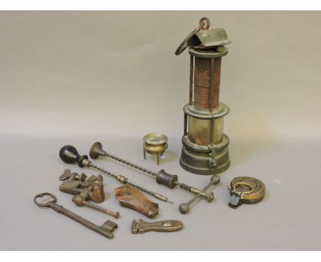 A small quantity of 19th century and later tools, a Nagretti & Zambra compass, two Archimedes drills, a thumb plane, etc, and