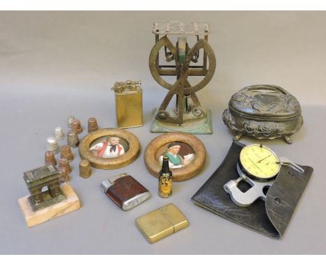 A collection of items, including lighters, letter scales, pewter lidded box, plaques, mirror, thimbles, etc