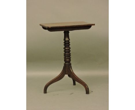 A 19th century mahogany lamp table, with turned support on three downswept legs, 50.9cm wide, 73cm high