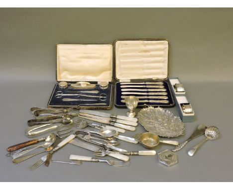 A box of silver and plate, including a cased manicure set, Iraqi silver, a niello compact, etc