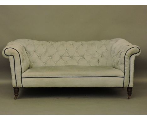A Victorian chesterfield sofa, with pale blue upholstery