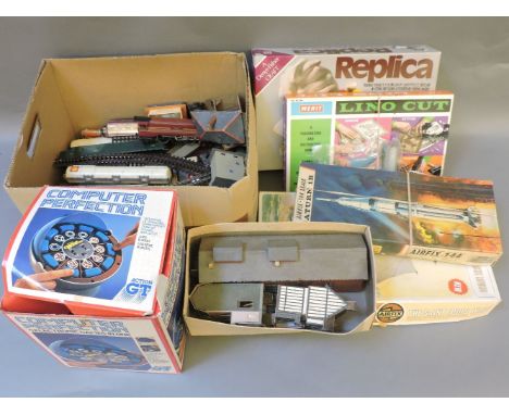 A quantity of 00 gauge track, model buildings, a King George VI locomotive, boxed Airfix kits, and a vintage computer Perfect