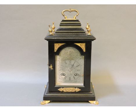 A George II style ebonised bracket clock, the silvered dial engraved Cattermoul, the German movement striking on a gong, 30cm
