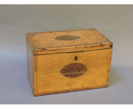 A George III elm, yew wood and rosewood crossbanded tea caddy