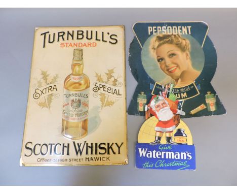 A Turnbulls Scotch Whisky advertising sign, a Watermans Christmas display, and a Pepsodent sign