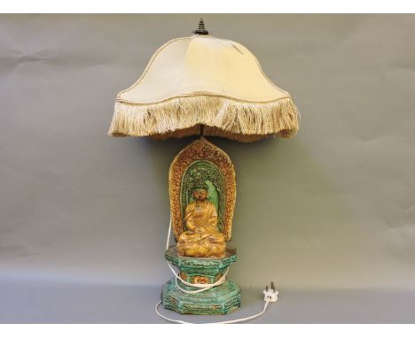 A tin glaze table lamp, modelled as Buddha seated with mandala, 73cm