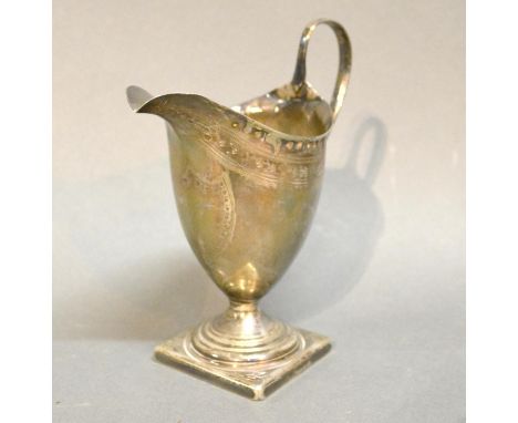 A George III Silver Helmet Shaped Cream Jug, with square pedestal base, London 1791 