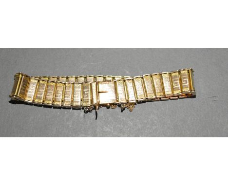 A 9ct. Gold Panel Bracelet, 15.1gm 