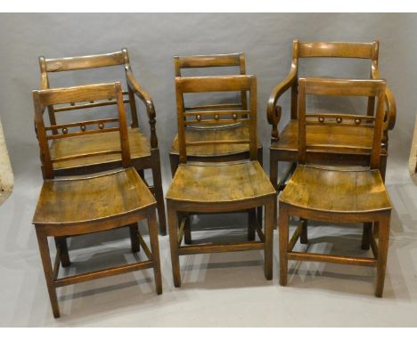 A Set Of Six Regency Elm Country Dining Chairs Comprising a pair of arms with four matching singles all with rail and ball ba