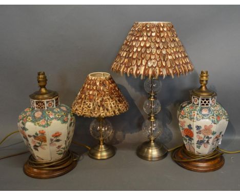 A Glass Table Lamp With Feather Shade Together With Another Similar and a pair of porcelain table lamps 
