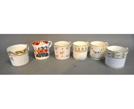 An Early 19th Century Worcester Coffee Can, together with five other similar early 19th Century English coffee cans 