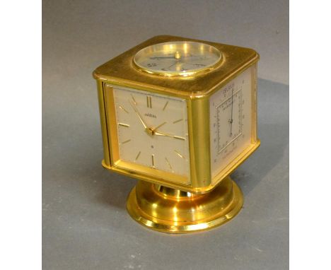 An Angelus Clock, Barometer, Thermometer And Hygrometer with compass in the top, 10.5cm tall 