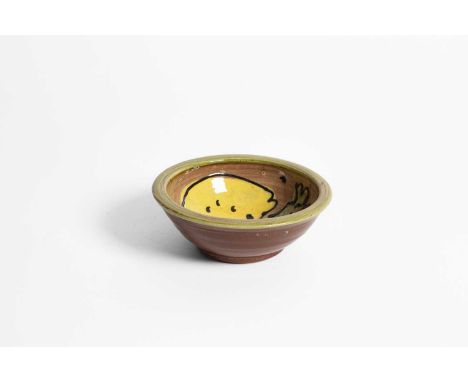 ARR Josie Walter (Contemporary) a small earthenware bowl painted decorated stylised fruit in green and yellow glazes, 14cm di